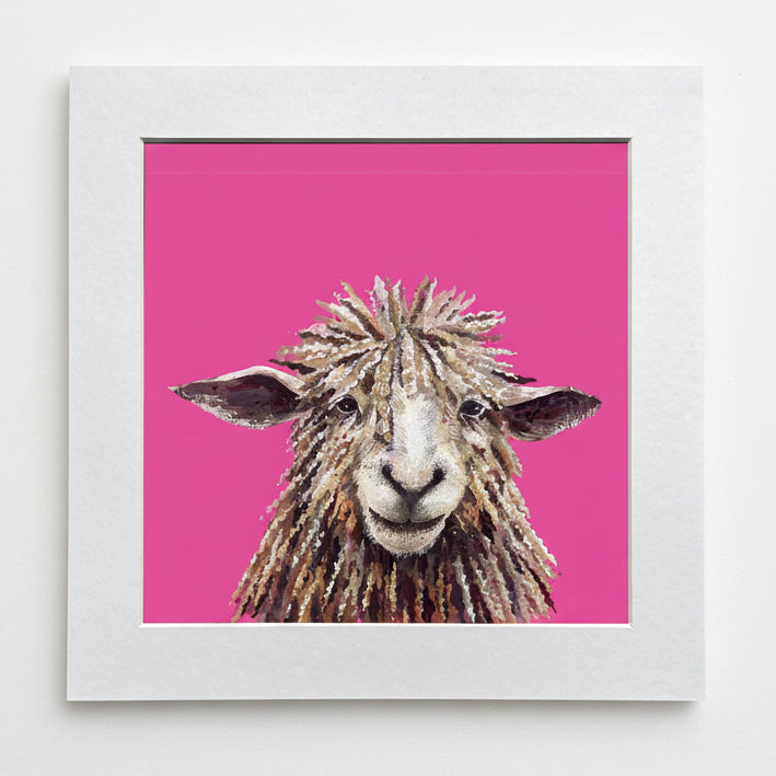 Framed artwork of a sheep on a pink background
