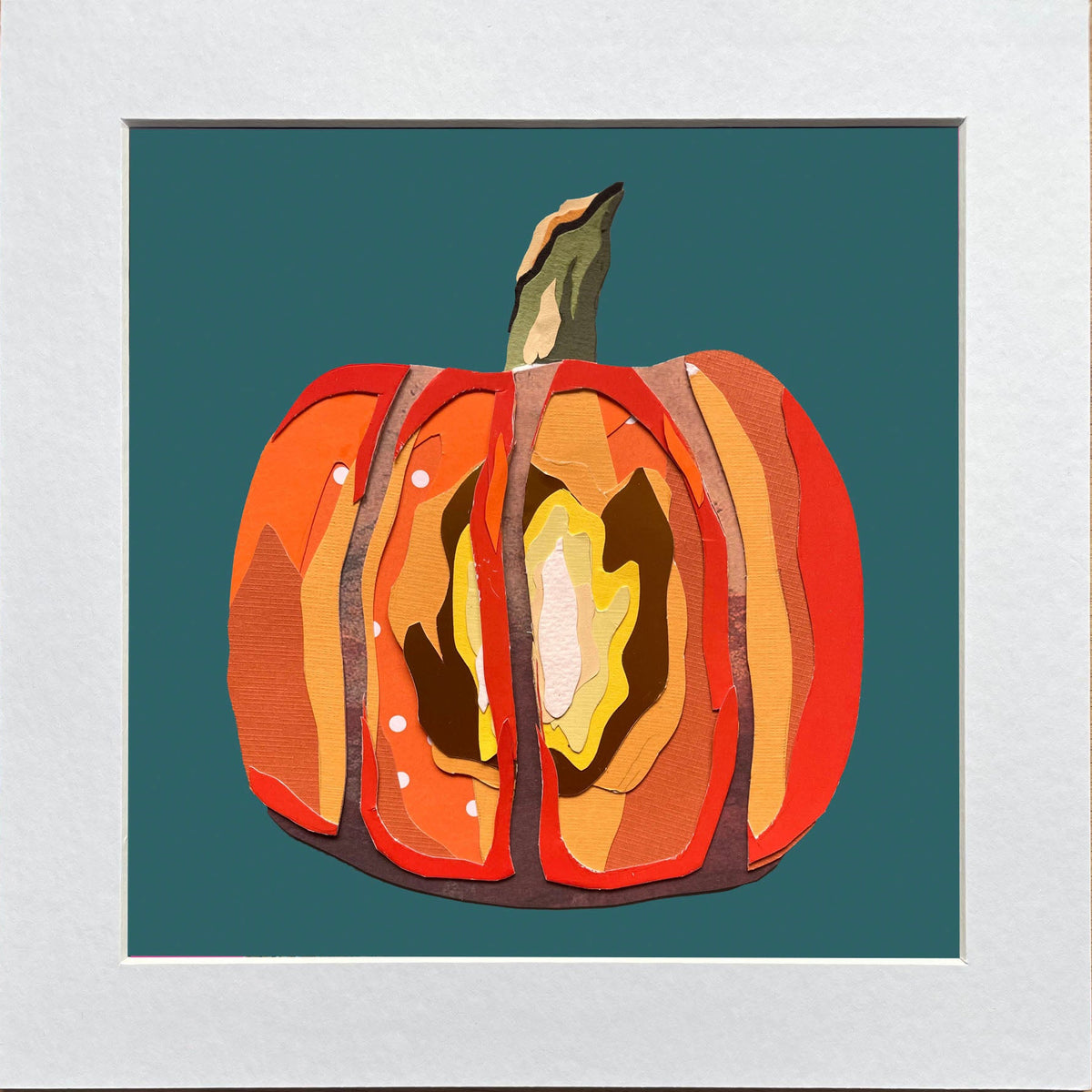 Mounted artwork of a stylized pumpkin on a teal background