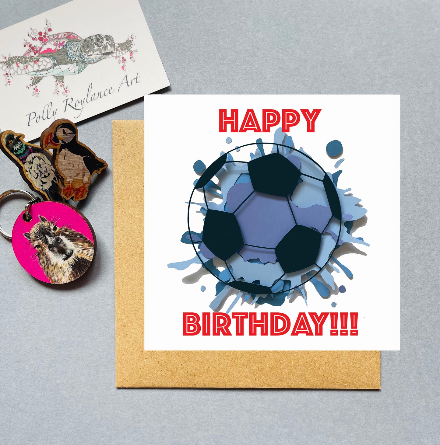 Birthday card with football design and 'Happy Birthday!!!' text.