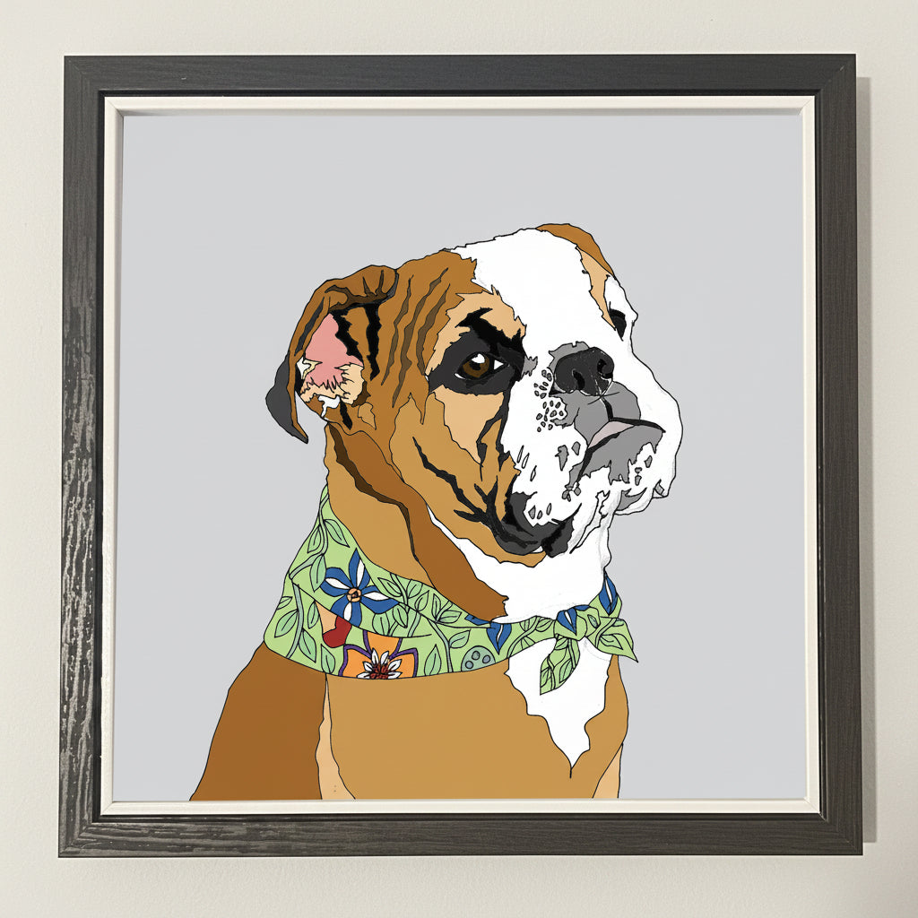 Framed illustration of a dog wearing a colorful bandana on a wooden surface