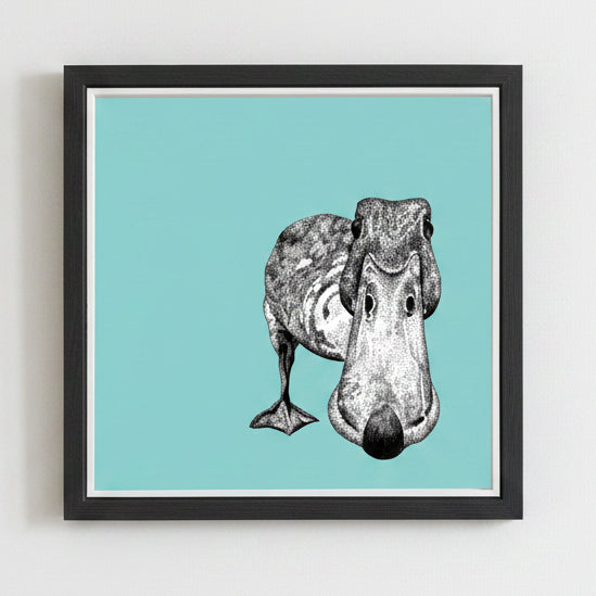 Framed illustration of a duck's face on a light blue background