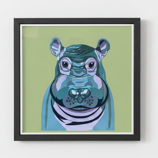 Framed illustration of a hippopotamus on a green background