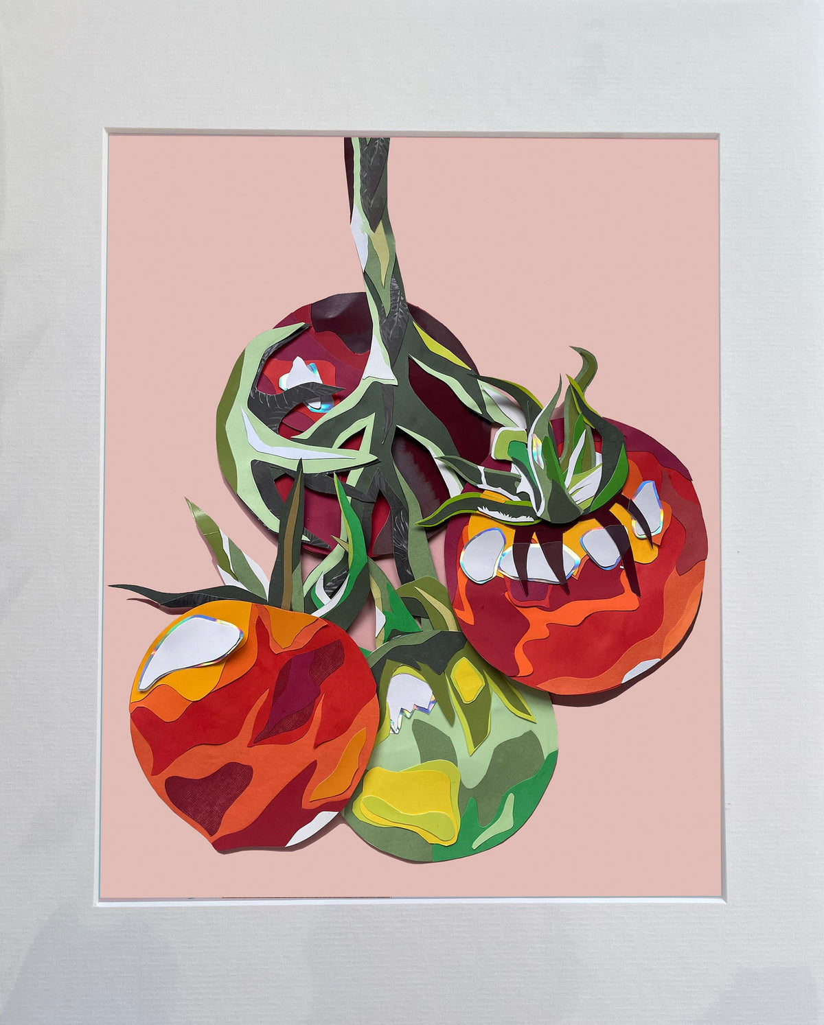Mounted artwork of tomatoes on a pink background