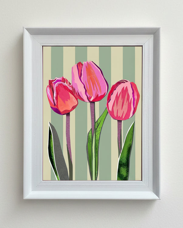 Framed artwork of pink tulips on a striped background