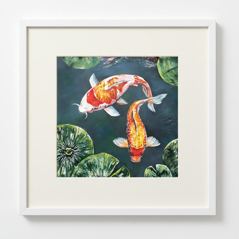 A painted koi pond scene featuring two orange-and-white koi fish swimming among green lily pads on dark blue water.