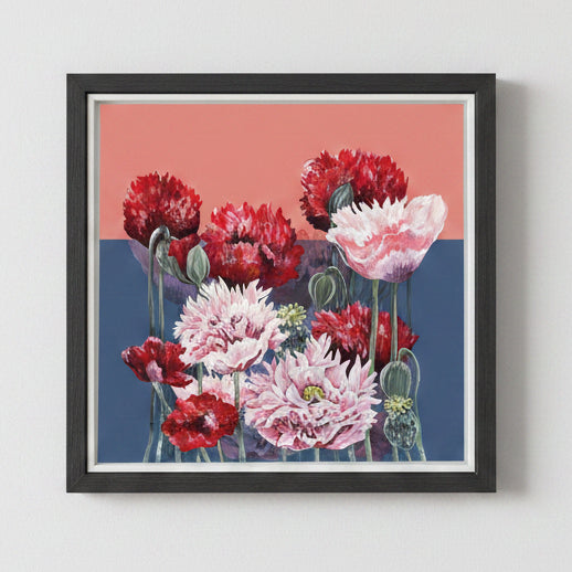 Framed artwork of red and pink poppies on blue and pink background.